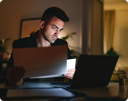 Frustrated man working late